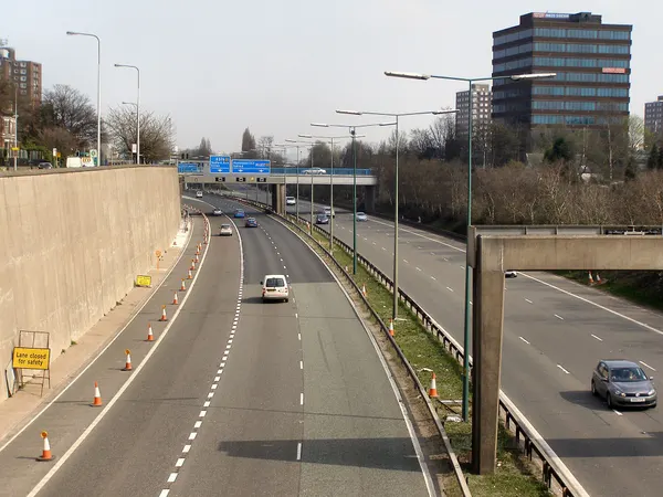 The M602: M602 towards Albert Road Bridge.. Looking along the M602 from the footbridge at Old Wellington Road. The bridge ahead carries Albert Road. To the righ